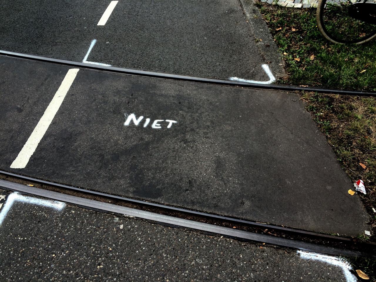 The word Not, written on the street